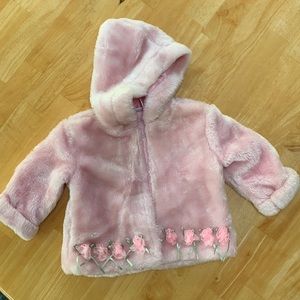 18 mo Pink fuzzy coat with rise detail.